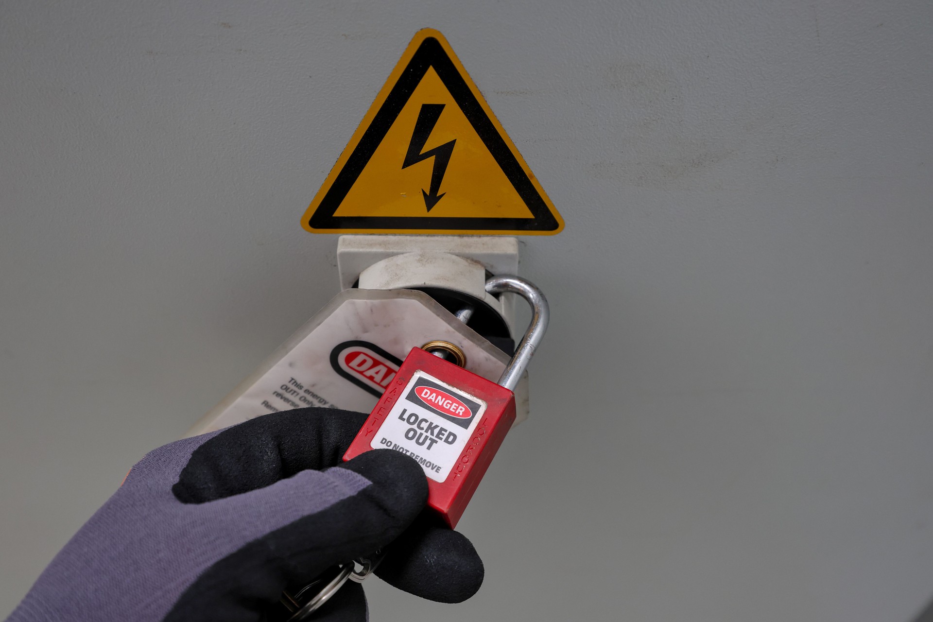Lockout, tagout of equipment or electrical cabinet. Safety procedure protecting workers. Preventing energy release, injuries and fatalities during maintenance work. Incident, accident prevention